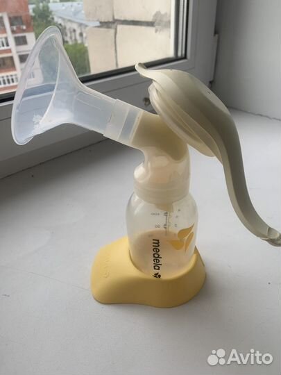 Молокоотсос medela ручной