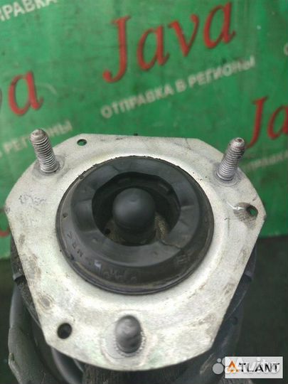 Стойка передняя левая mazda demio