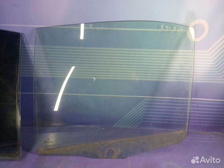 Стекло двери заднее левое/правое Bmw E39