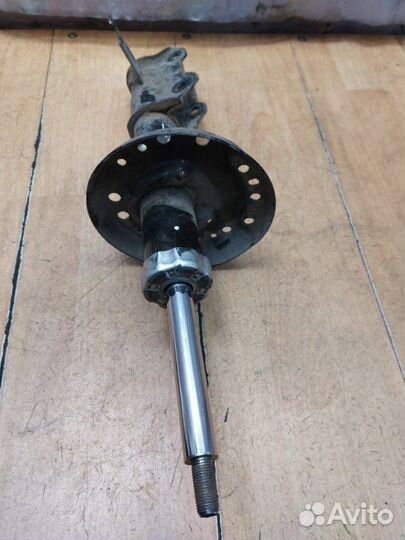 Стойка подвески передняя правая Opel Astra J