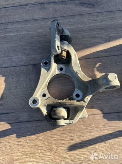 Поворотный кулак левый Opel Astra GTC 1.4 2012