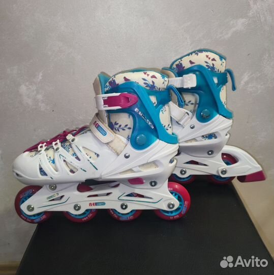 Роликовые коньки