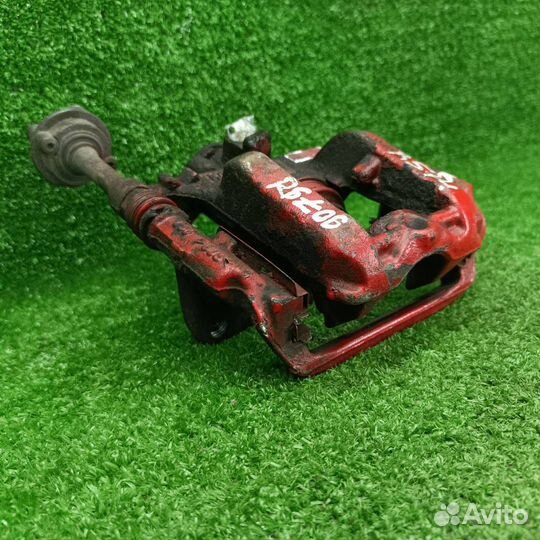 Суппорт тормозной задний правый Opel Astra J GTC