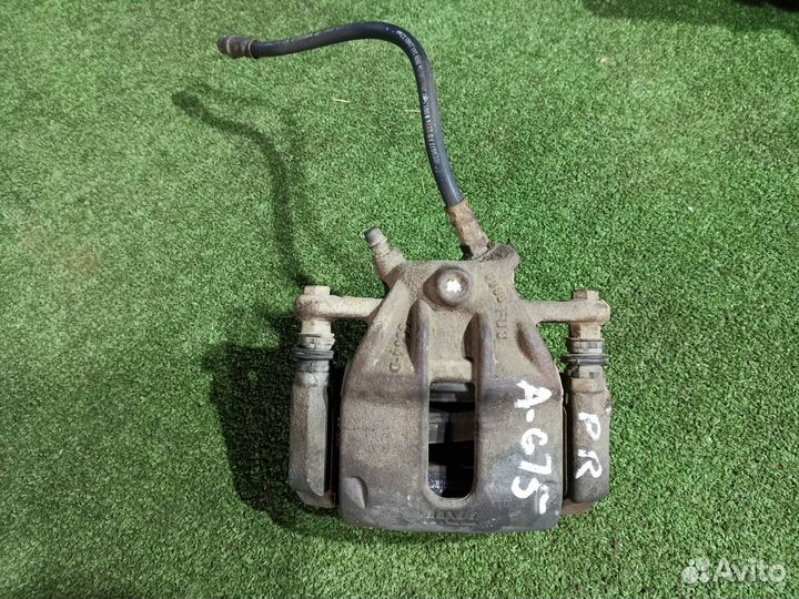 Тормозной суппорт передний правый Nissan Almera