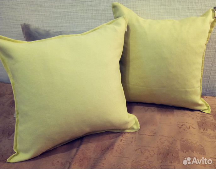 Подушки пуховые в декоративных наволочках