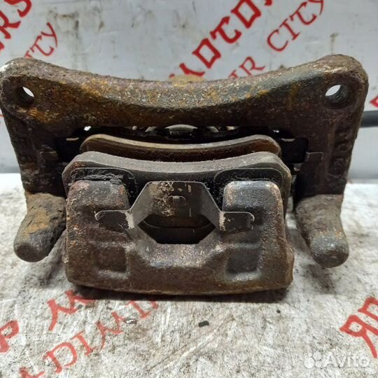 Суппорт тормозной задний левый Mitsubishi