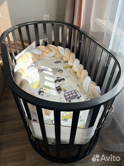 Детская кроватка с маятником круглая