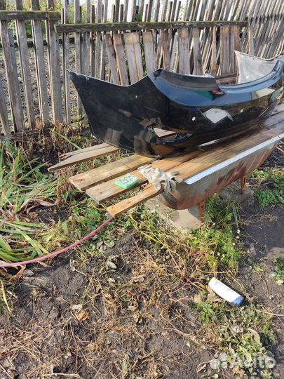 Задней бампер hyundai solaris чёрный