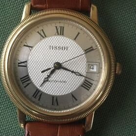 Золотые часы Tissot