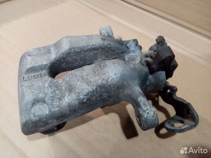 Суппорт тормозной Opel Astra/Meriva/Zafira