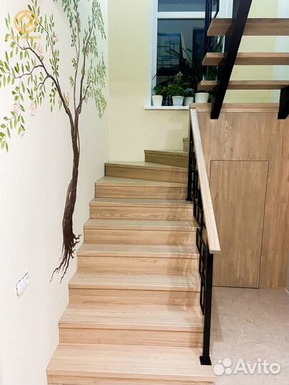 Облицовка металлических лестниц деревом