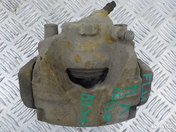 Суппорт тормозной передний левый Renault Fluence 2