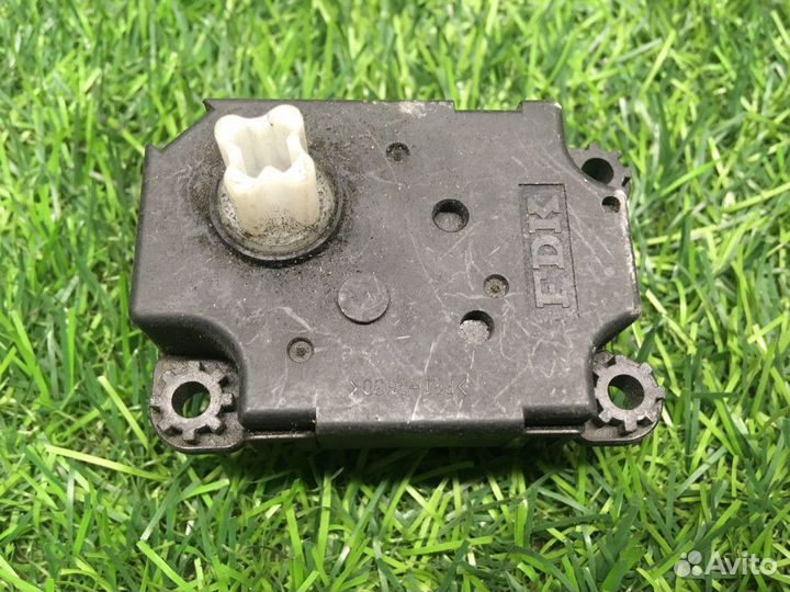 Моторчик заслонки отопителя Opel Astra H / Family