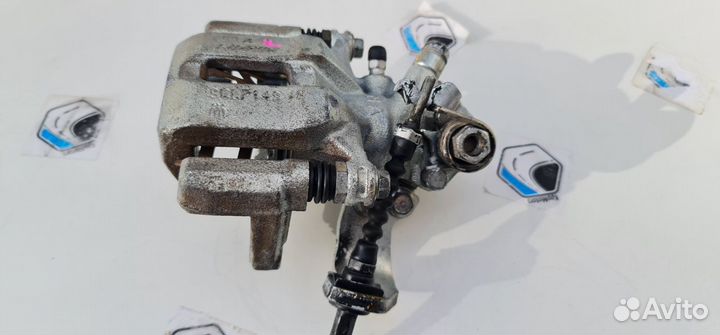 Суппорт задний левый задний левый Хонда цивик 4D