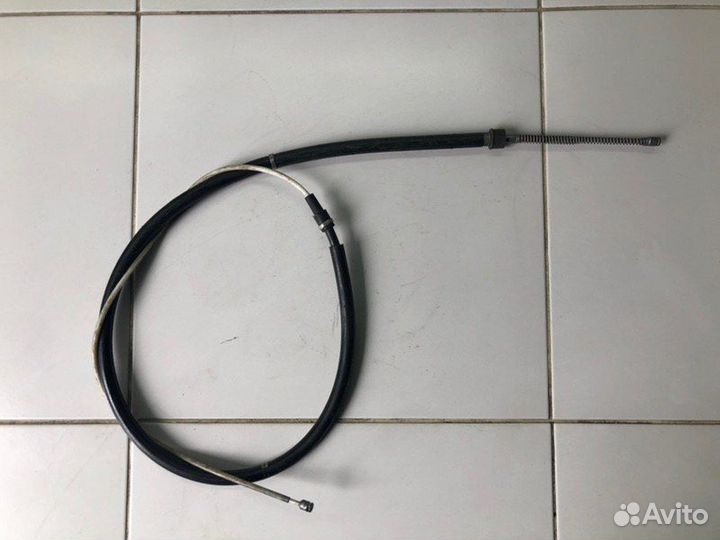 Трос стояночного тормоза задний левый Volkswagen