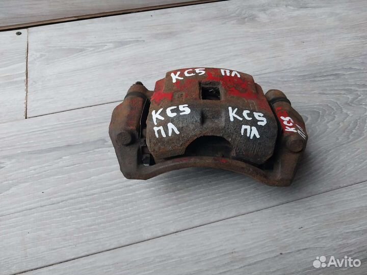 Суппорт передний Kia spectra левый / правый