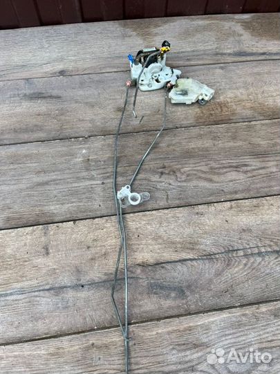 Замок двери передний левый Nissan Almera N16 1.5