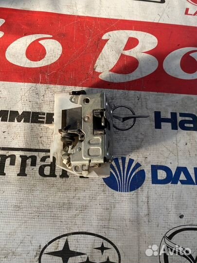 Замок двери задний левый Renault Symbol 2 K4J712