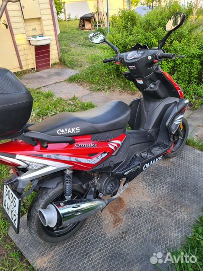 Скутер Omaks