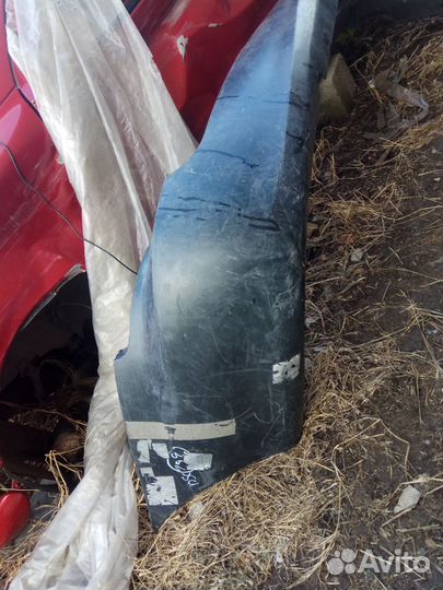 Бампер задний Kia Carnival 1999-2006