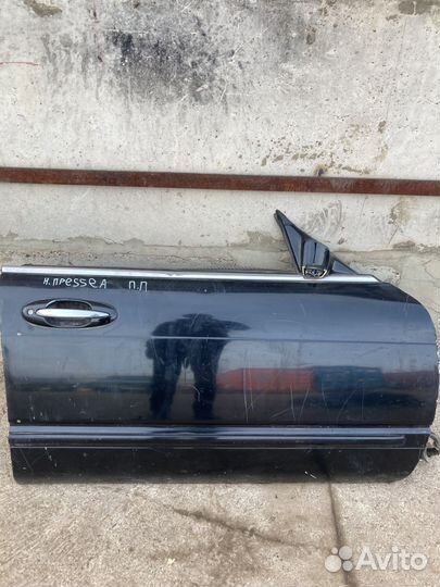 Передняя правая дверь Nissan presea