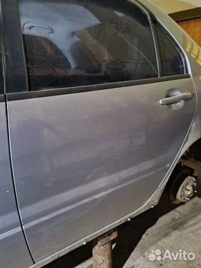Дверь боковая задняя левая Mitsubishi Lancer 9