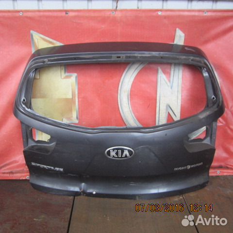 Крышка багажника Kia Sportage бу с дефектом мокрый