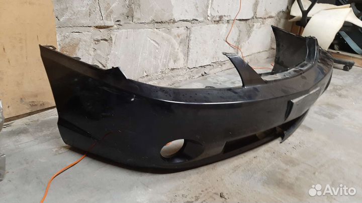 Бампер kia spectra