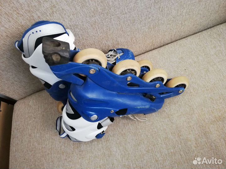 Роликовые коньки