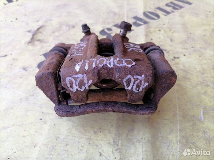 Суппорт задний правый Toyota Corolla 120 2001-2006