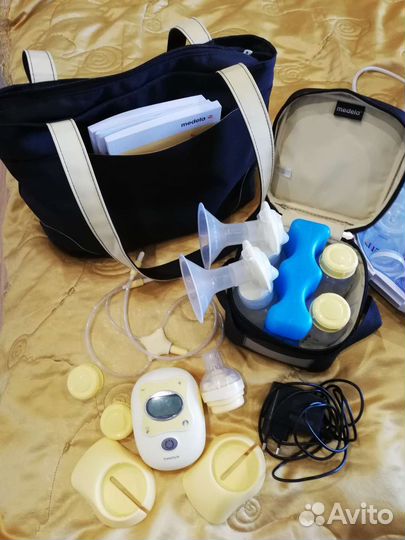 Молокоотсос с дорожным набором