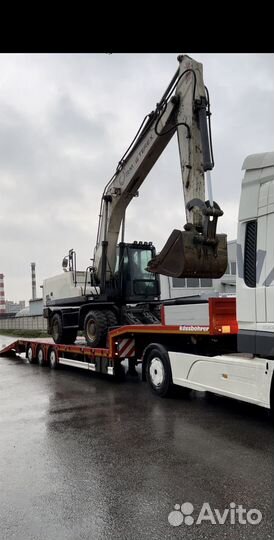 Машинист колесного экскаватора