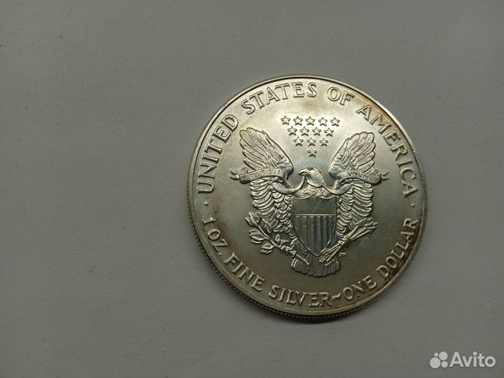Монета Американский серебрянный 1 доллар 1991 года