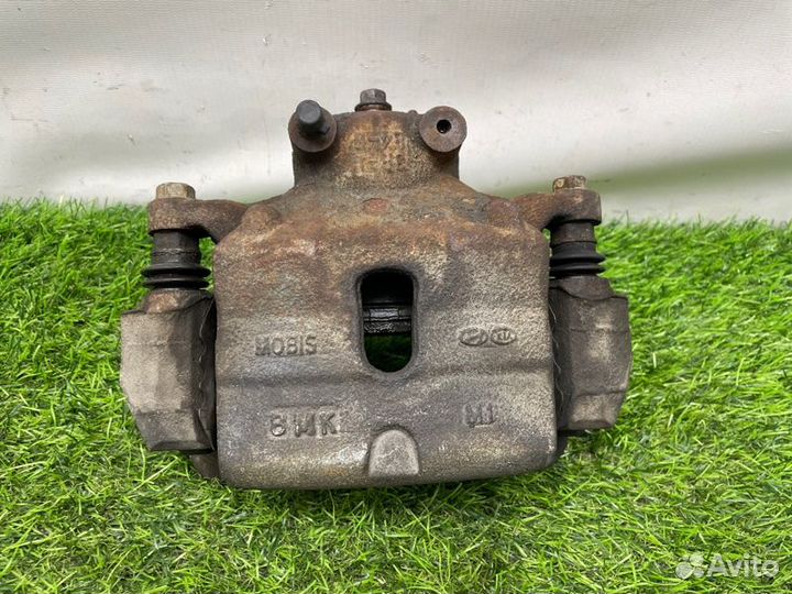 Суппорт тормозной передний правый Kia Optima JF