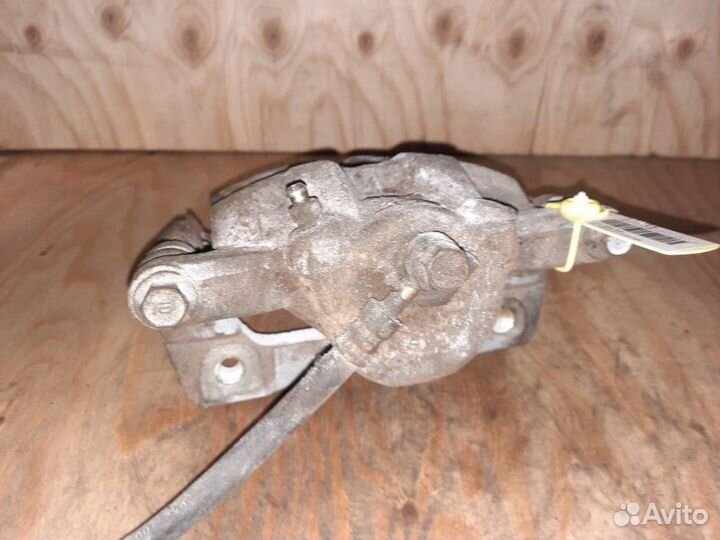 Суппорт передний левый Honda Torneo CF4 F20B 1998