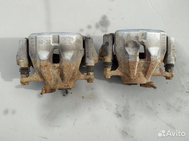 Суппорт тормозной передний Toyota Corolla (E150) X