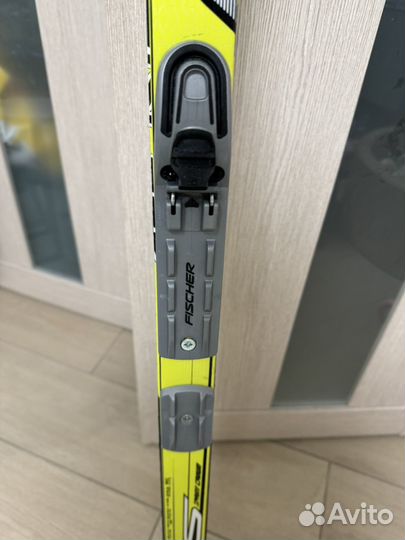 Беговые лыжи и ботинки fischer
