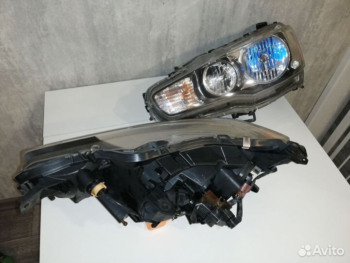 Фара передняя левая лансер 10
