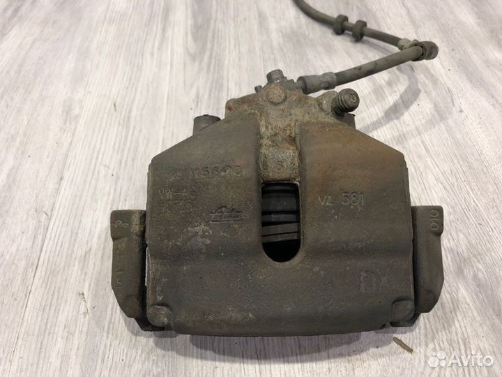 Суппорт тормозной передний правый Volkswagen Polo