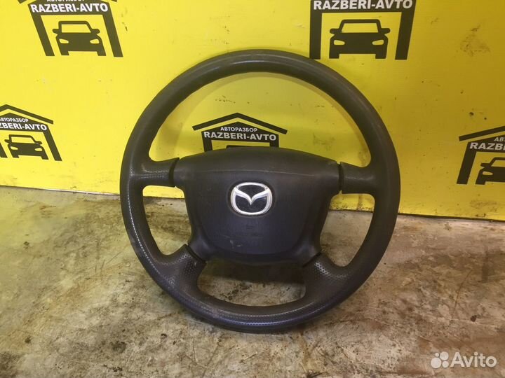 Руль mazda familia