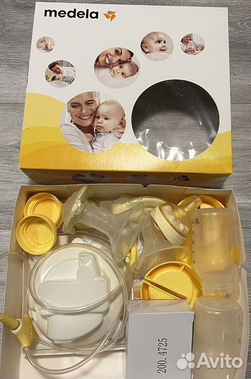 Молокоотсос medela swing электрический двойной