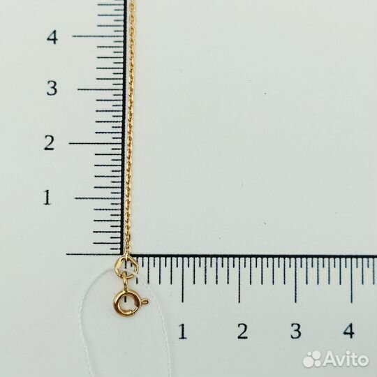 Золотое колье с камнем