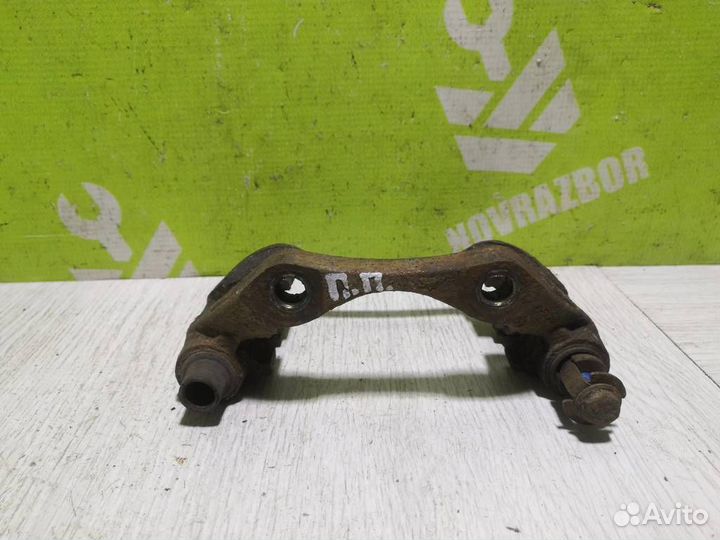 Скоба суппорта переднего Пежо 206