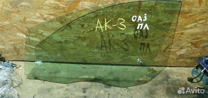 Стекло двери передней левой Opel Astra J 2010-2017