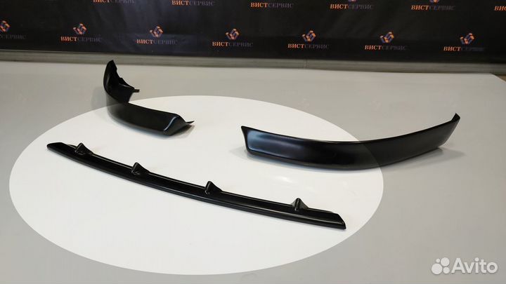 Клыки бампера lancer 10