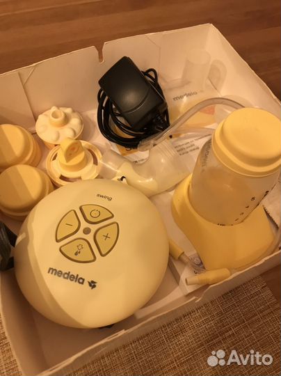 Молокоотсос medela swing