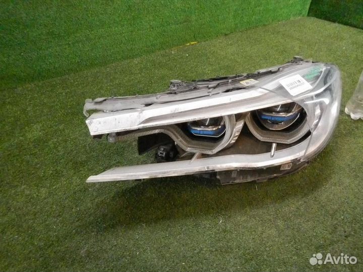 Фара левая BMW 7-Series