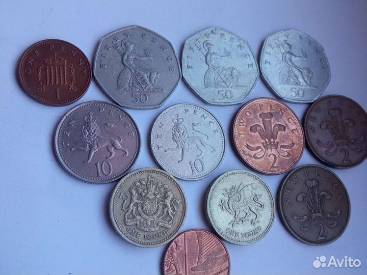 Коллекция английских монет.фунты.пенсы