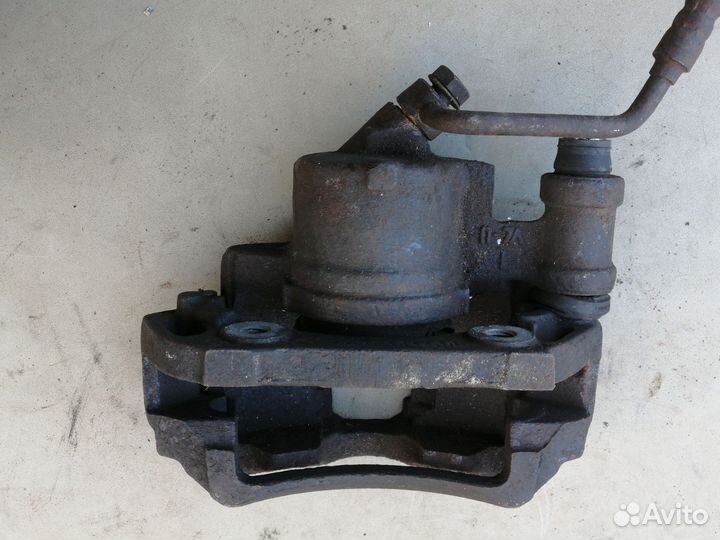 Суппорт тормозной передний правый для Ford Escort