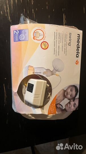 Молокоотсос medela swing электрический
